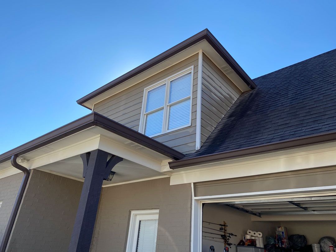 New vinyl windows installed on the second story of Memphis home