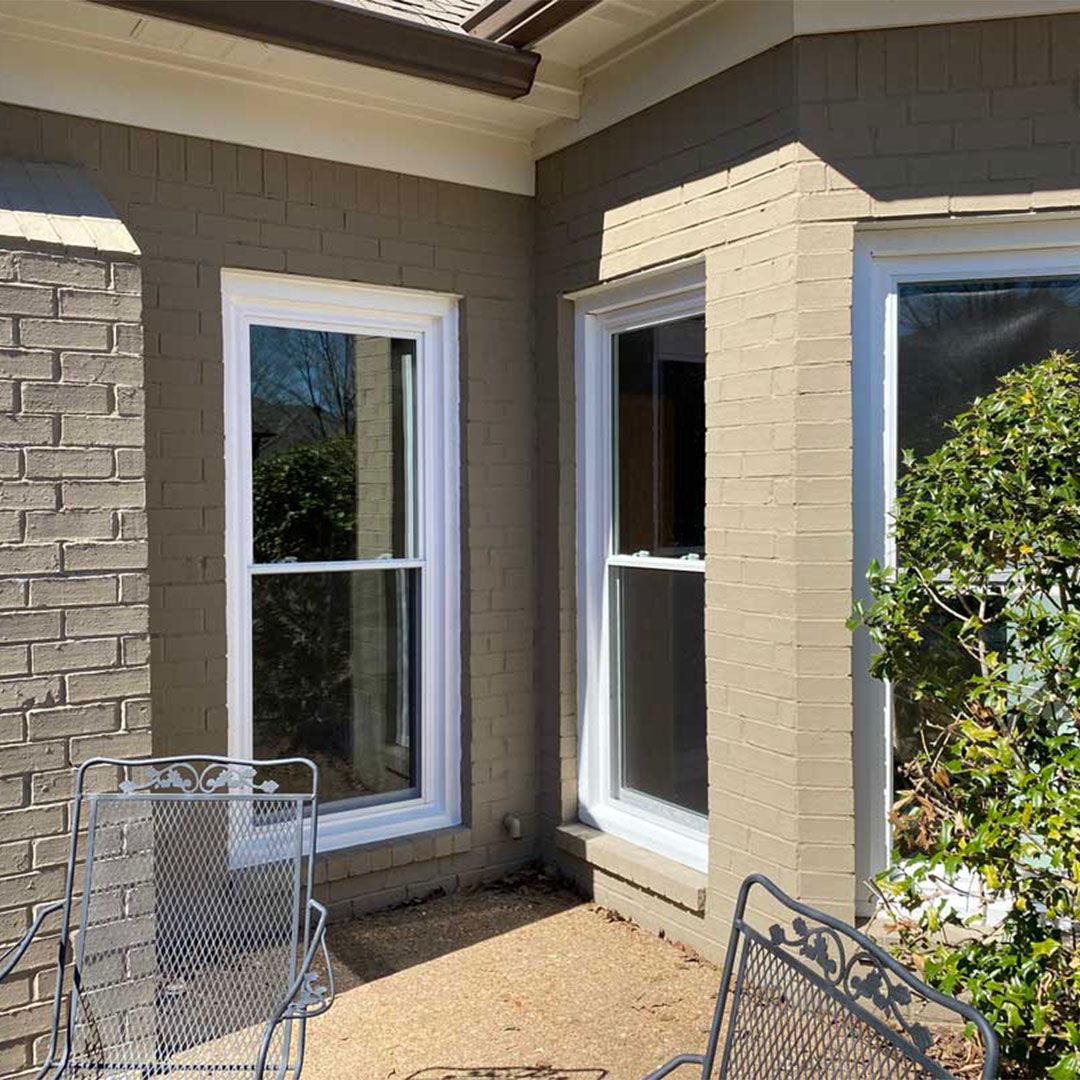 Three new vinyl window replacements.