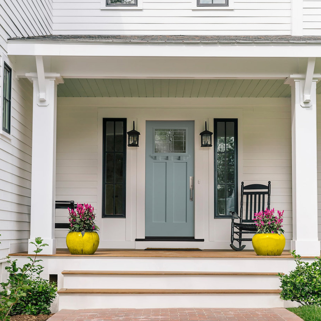 Stylish blue colored entry door from Pella.