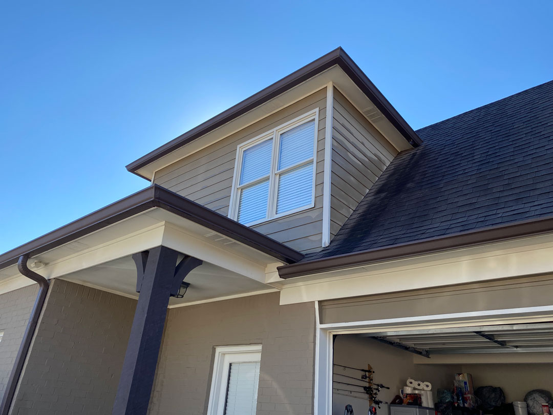 New vinyl windows installed on the second story of Memphis home